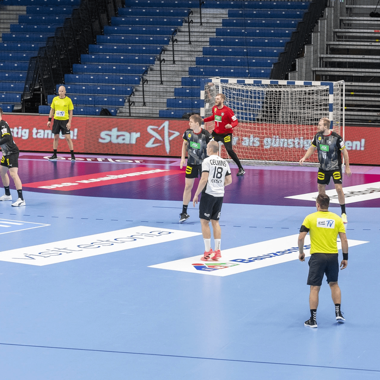Handball match with LED boards and branded court graphics